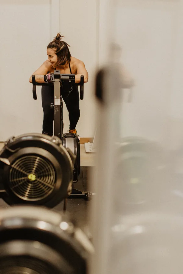 Athlete training on Concept2 rower during Abs and Cals class